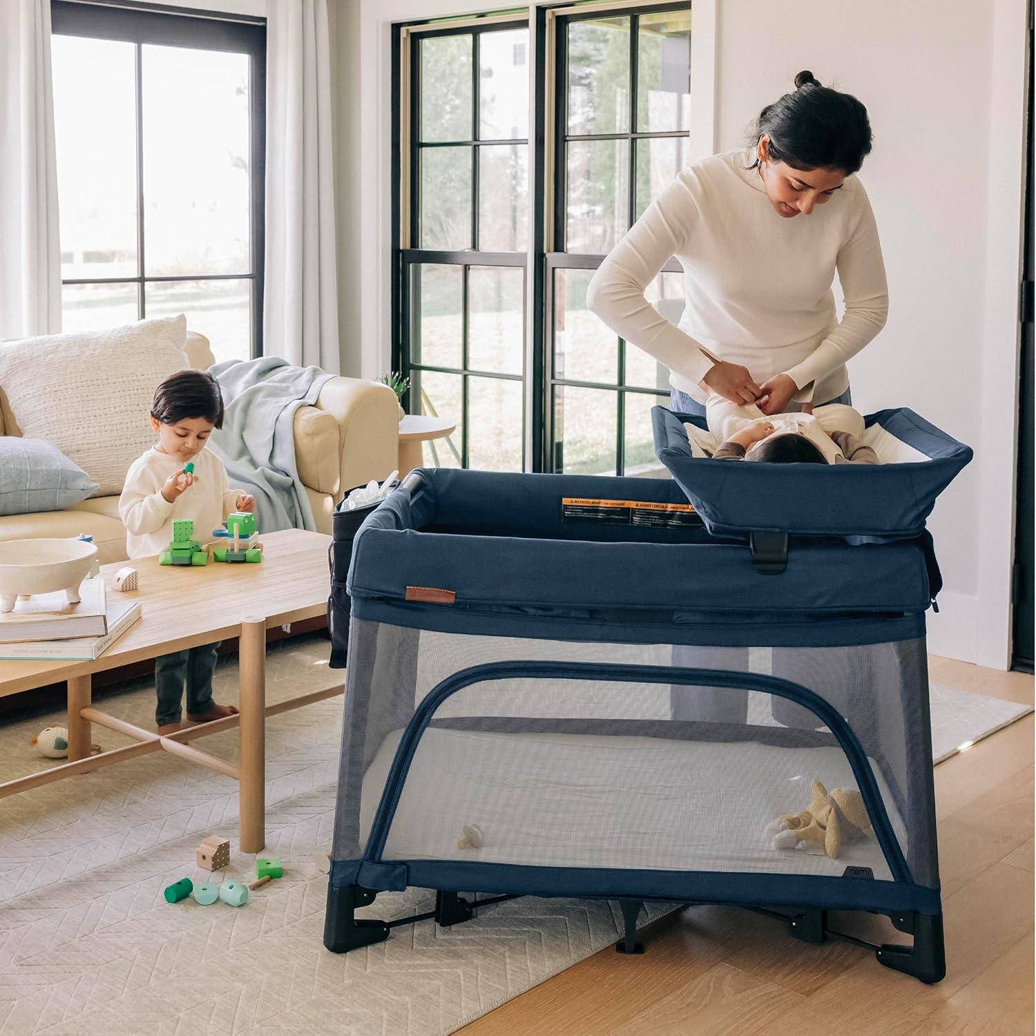 imageUPPAbaby Remi Changing StationWipeable SurfaceSimple Attachment and StorageJake CharcoalCharlie Sand Mlange